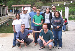 A group of students in front of the pool at a nearby hot springs.